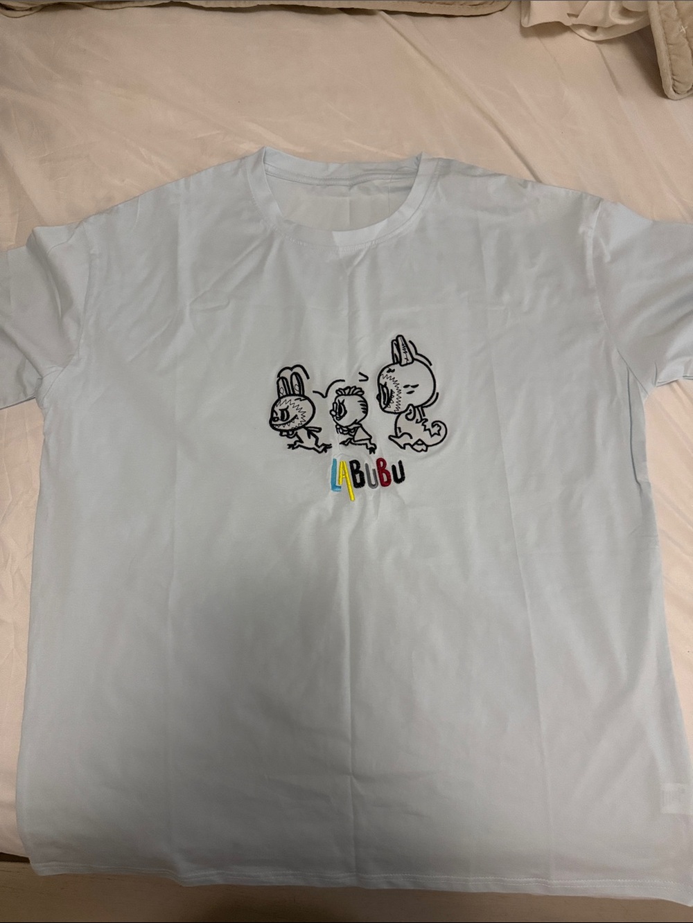 Unbranded Light Blue Graphic Short Sleeve Tee - 'LaBibu'